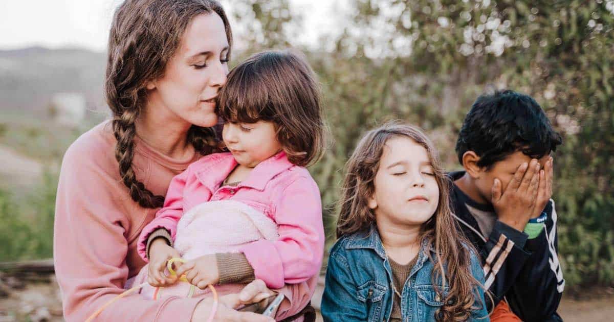 family praying together