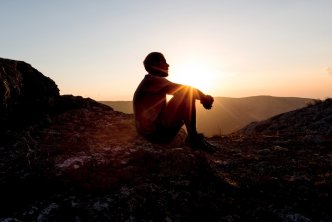 image of man looking out across valley for a post about resources for lent