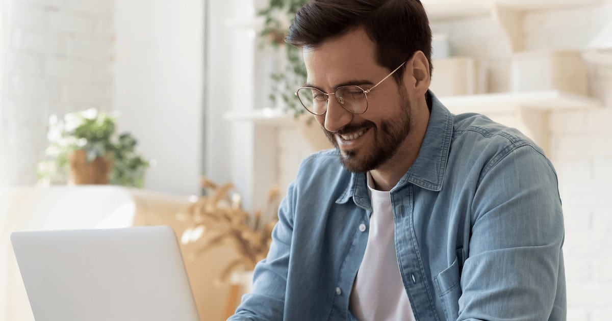 Man on computer for a post about the Theological Dictionary of the Old Testament