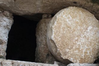 stone in front of tomb for post about the suffering servant in Isaiah