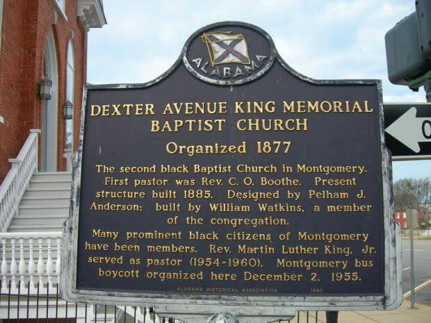 A memorial signpost for Dexter Avenue King Memorial Baptist Church, founded in 1877 by Charles Octavius Boothe and pastored by Rev. Martin Luther King Jr. from 1954 to 1960.