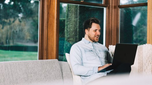 Man working on church website