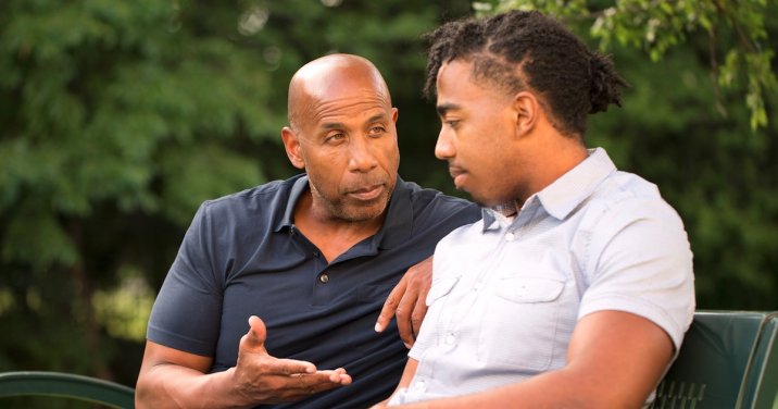 Man mentoring another man