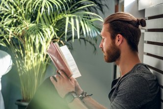 Man reading for a post about eerdman's resources