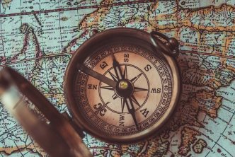 A Compass and map for a post on christian mission