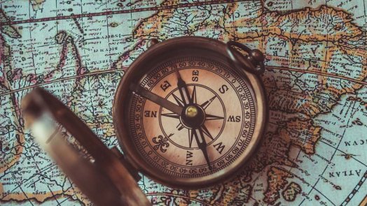 A Compass and map for a post on christian mission