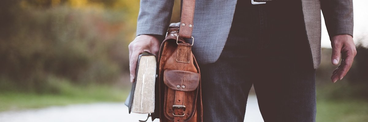 Man with a Bible for a post featuring quotes about the Christian life