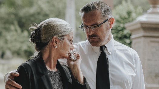 Pastor caring for a grieving woman for a post about pastoral empathy