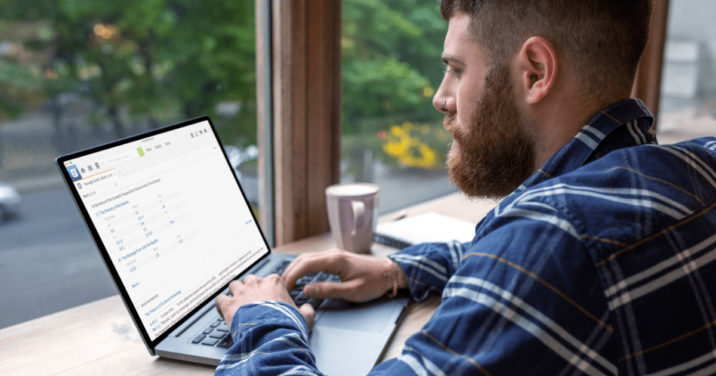 man at desk uses logos to do new testament research