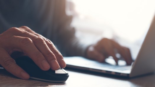 man on computer for post about how to select resource text