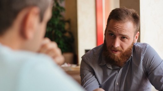 Man talking to a friend for a post about sabbath rest