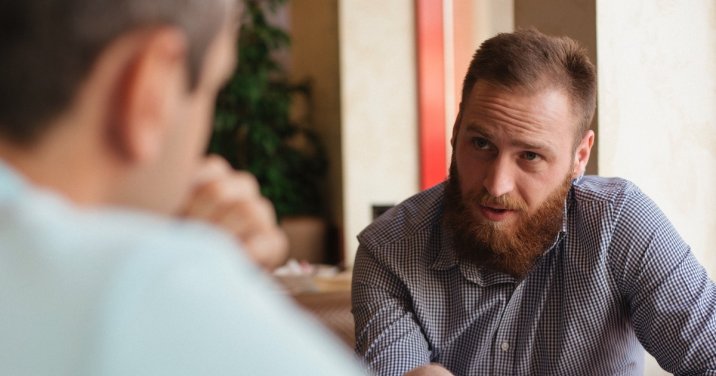 Man talking to a friend for a post about sabbath rest