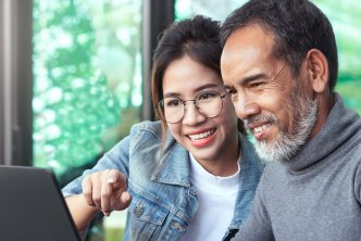 image of couple looking at computer considering how to get logos 9