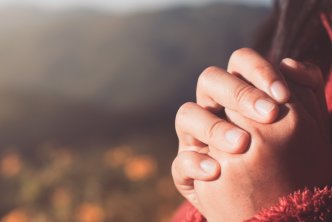 image of praying hands for post about pastor appreciation day