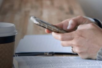 woman holding smartphone