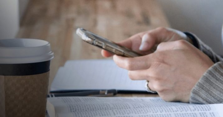 woman holding smartphone