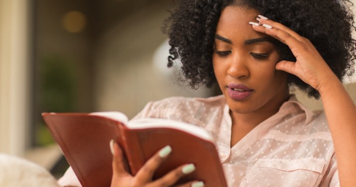 a woman reading the Bible taking care not to take verses out of context
