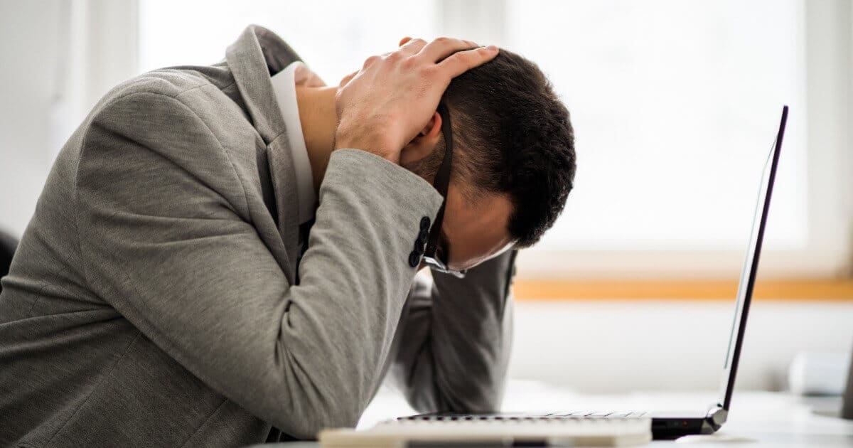 Man thinking in front of his computer