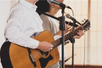two worship leaders teaching new worship songs