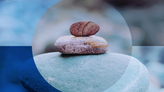 a large and small rock sit against a blue background to represent unexpected Mother's Day sermon ideas