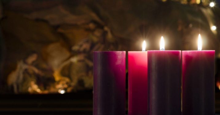 Advent candles lit before Scripture readings