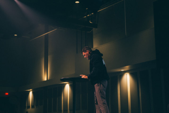 Pastor standing over pulpit