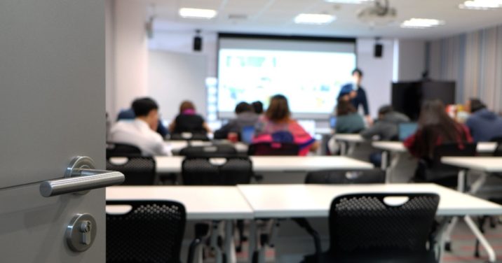 open door to a seminary classroom, students inside