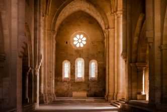 A cathedral with light streaming through windows