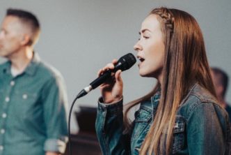 worship team members lead Thanksgiving worship songs