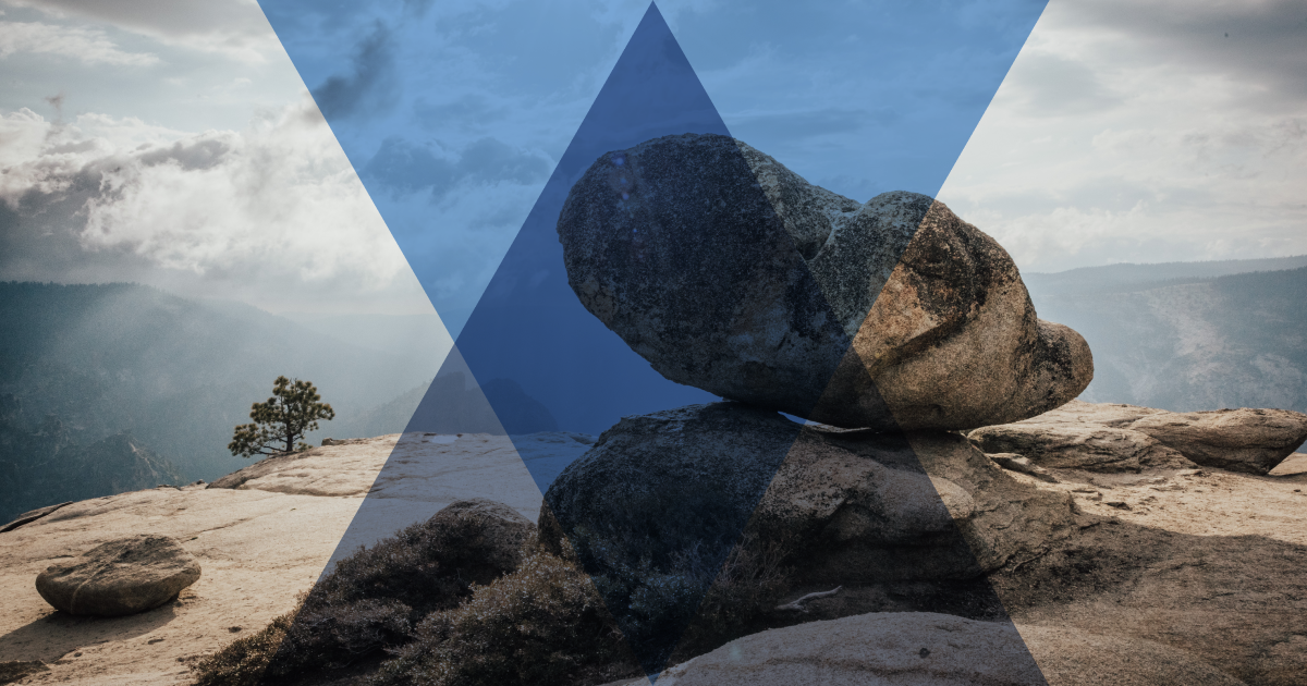 Small rocks stacked on top of a larger rock to convey ideas about fathers day. Sermon ideas inside.