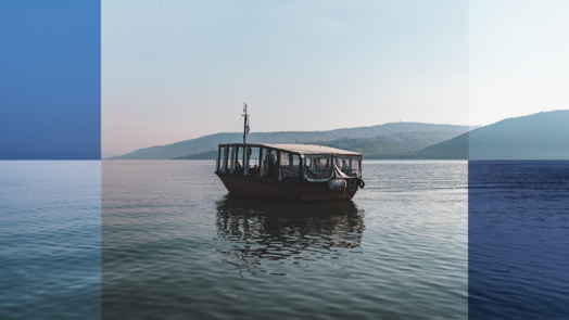 Graphic of an ancient ship on the water.