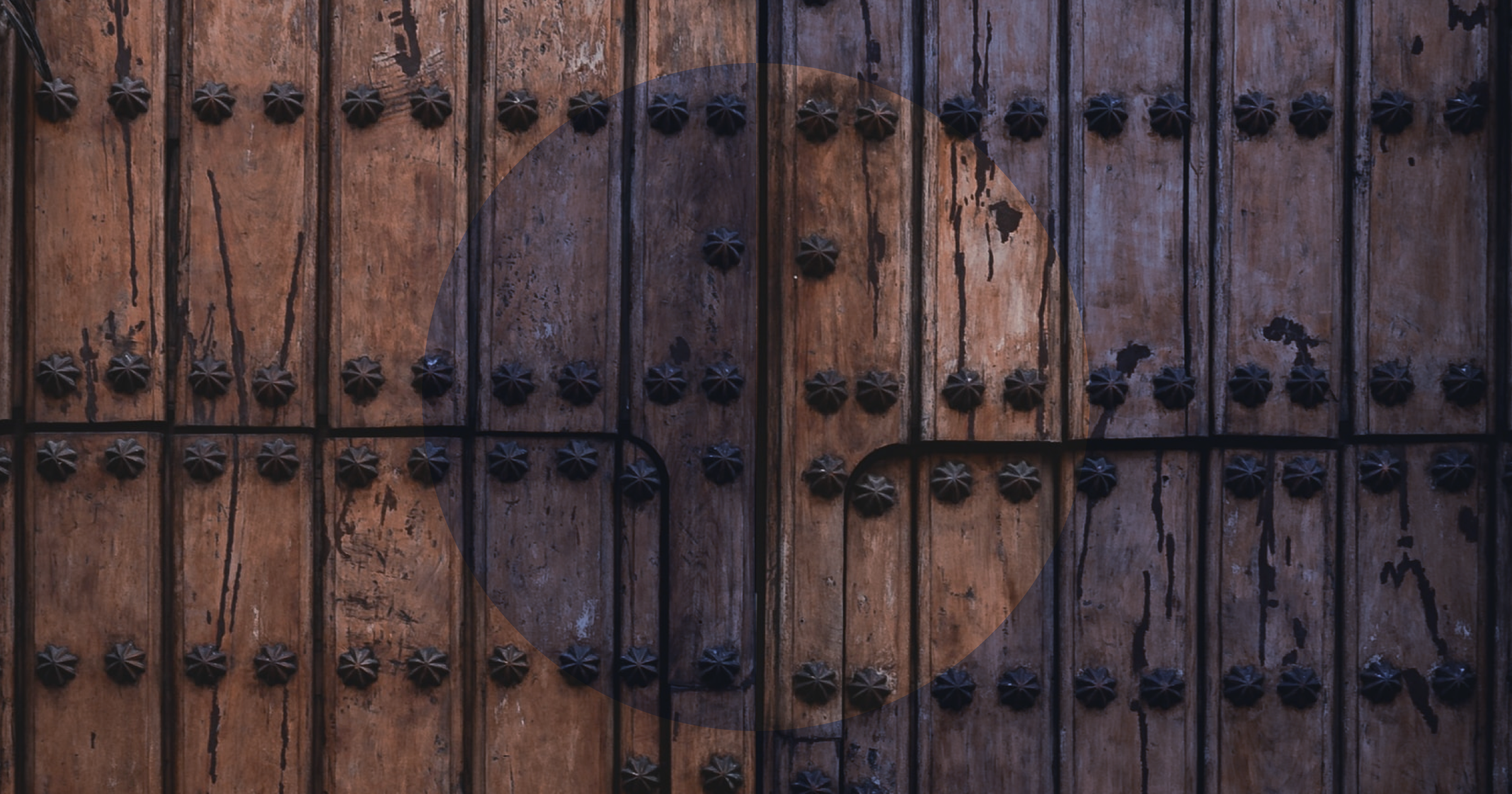 An image of a door that represents Wittenberg Chapel where Martin Luther nailed the 95 Theses which sparked the beginning of the Reformation
