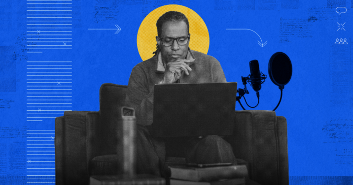 A preacher sitting down with an open Bible and a laptop symbolizing technology enhanced sermon preparation.